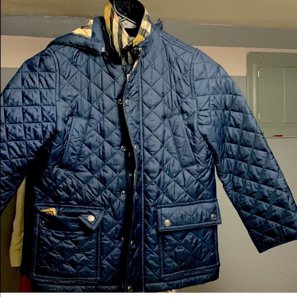 Used new condition burberry unisex spring/ fall jacket price firm